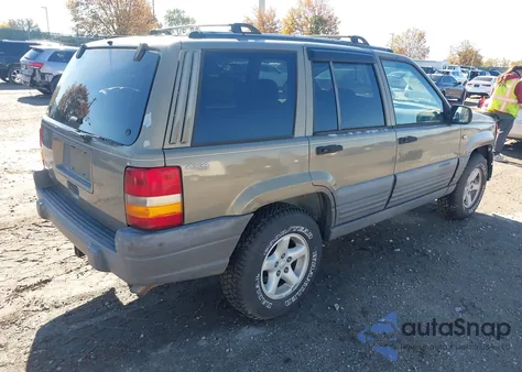 1997 Jeep Grand Cherokee Laredo/Tsi from USA, damaged, VIN 1J4GZ58S2VC633512